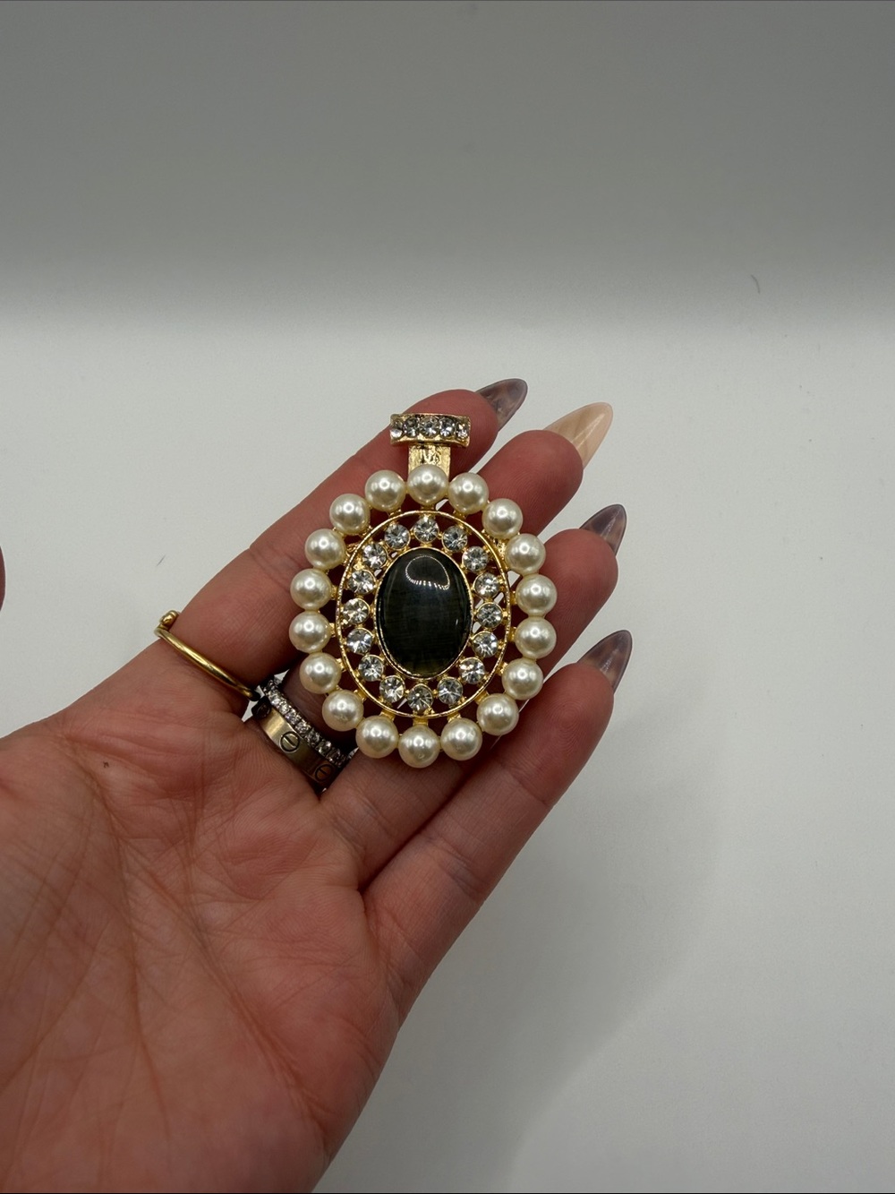 032. Gold Pearl Pendant with Black Center and Clear Crystals